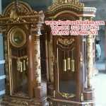 model lemari jam hias ukiran